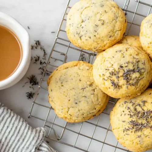 Earl Grey cookies on a plate with tea.