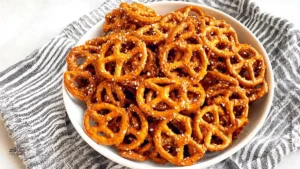 spicy pretzels recipe baked with ranch and cayenne in a white bowl